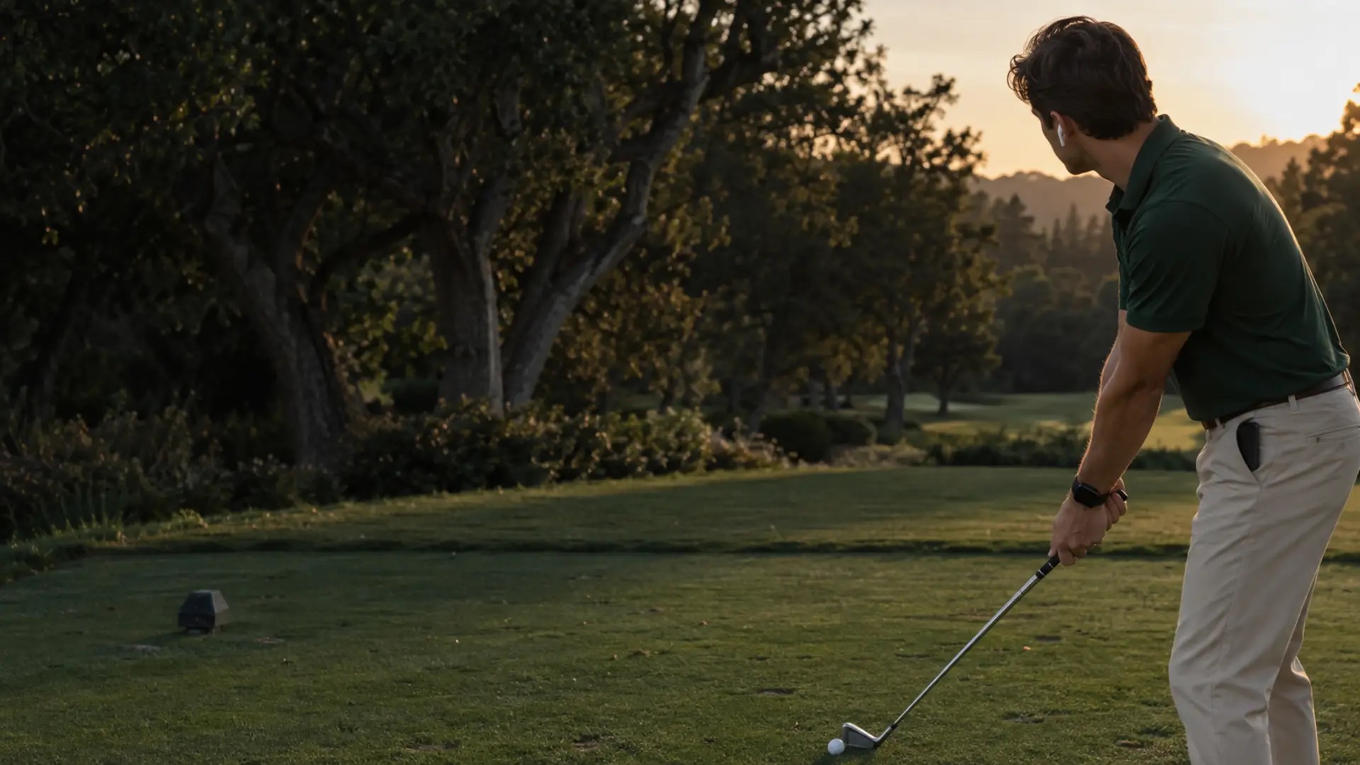 An iPhone in a golfer's front pocket at the range